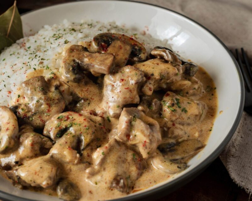 Говядина, тушенная с грибами